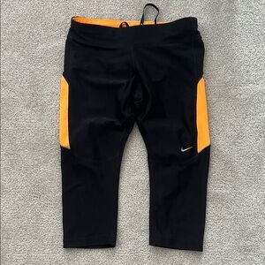 Nike Black Leggings with Vibrant Orange Panels